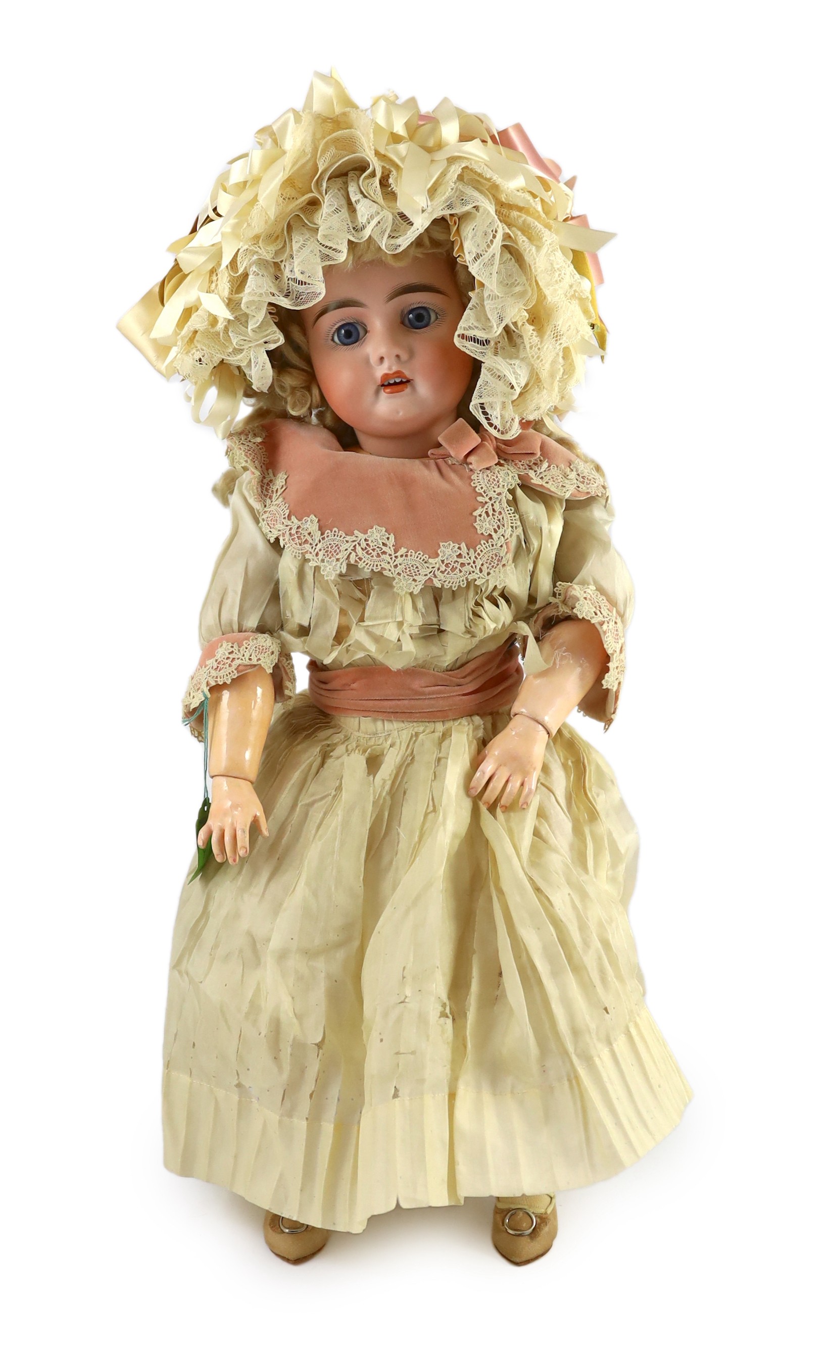 A fine and rare Frederick Edmund Winkler bisque doll, in original box, German, circa 1894-1899, 24in.